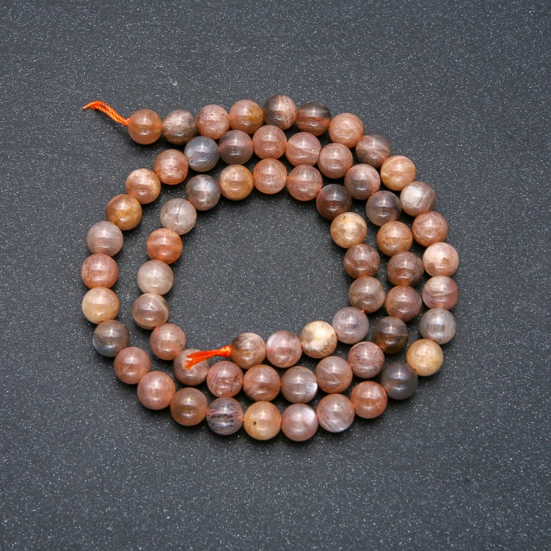 Koraliki na nici z naturalnego selenitu, gładkie kulki, średnica 6 mm, długość 39 cm