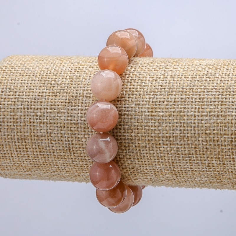 Bransoletka na gumce z naturalnego kamienia selenitu, średnica 12 mm, obwód 18 cm+