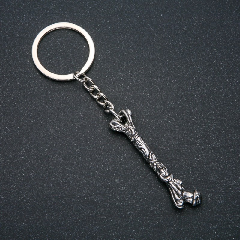 Brelok «Kość», średnica 56×13 mm, długość 11 cm, srebrzysty metal