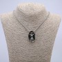 Wisiorek Czaszka 32×18 mm na łańcuszku, długość 65 cm, kolor metalu: srebro