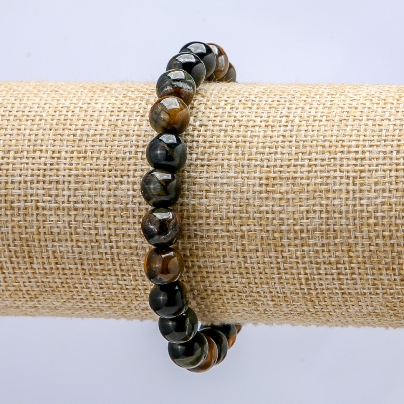 Bransoletka na gumce z naturalnego kamienia sokole oko, gładka kulka, średnica 8 mm+