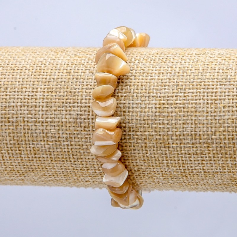 Beżowa bransoletka z naturalnej masy perłowej — beżowe drobiny, średnica 7×5 mm