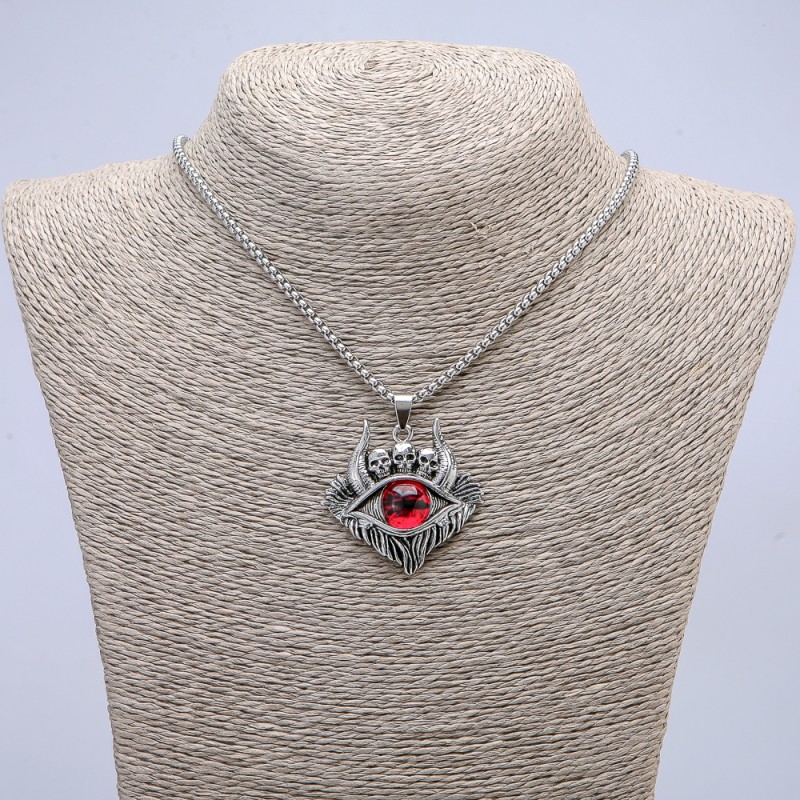 Wisiorek „Oko demona” 45 × 40 mm na łańcuszku, długość ok. 70 cm, srebrzysty metal