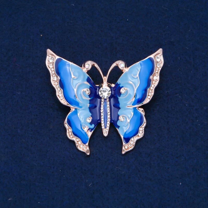 Broszka Motyl – białe kryształy, emalia błękitna i granatowa, złoty metal 47×52 mm +