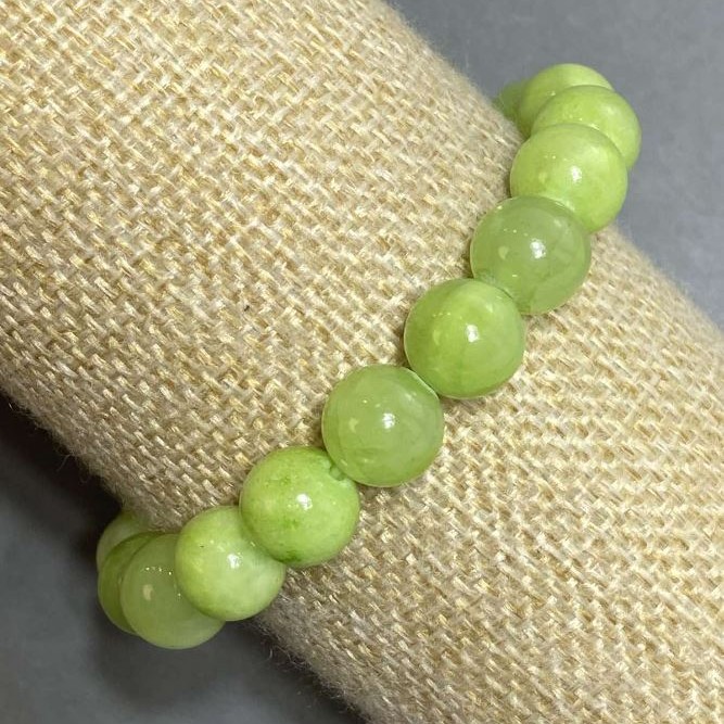 Bransoletka z onyksu na elastycznej gumce, gładkie kulki, średnica 10 mm, długość 18 cm