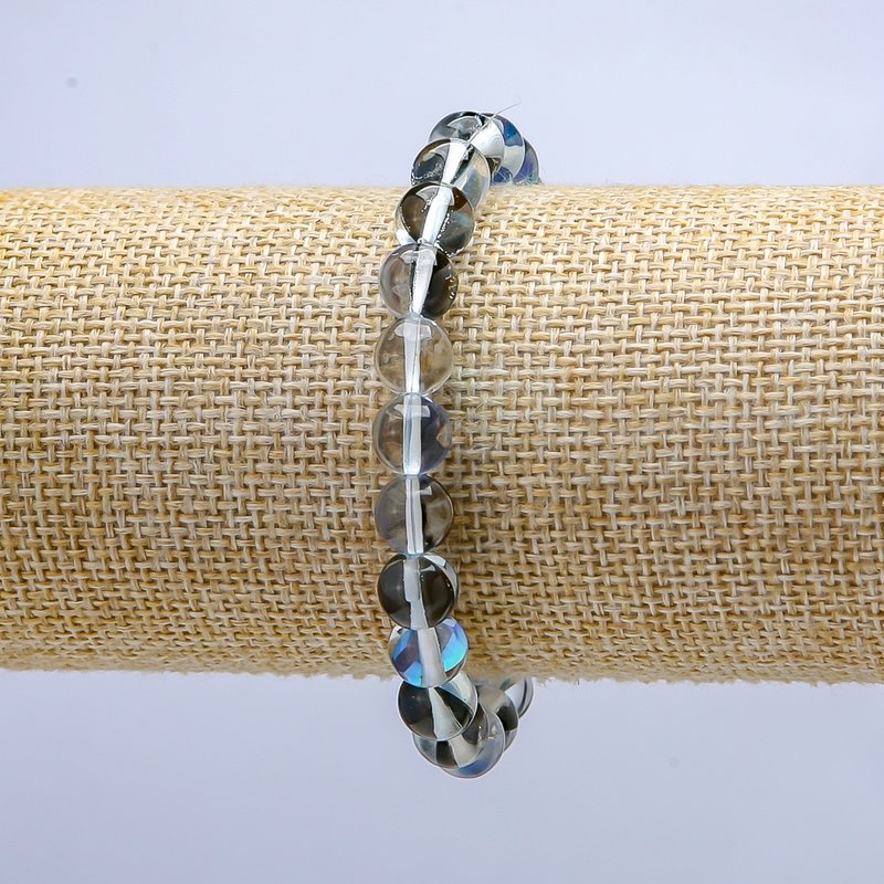 Bransoletka z błękitnego opalowego szkła, efekt kameleona, na gumce, gładkie kulki, średnica 8 mm, długość 18 cm