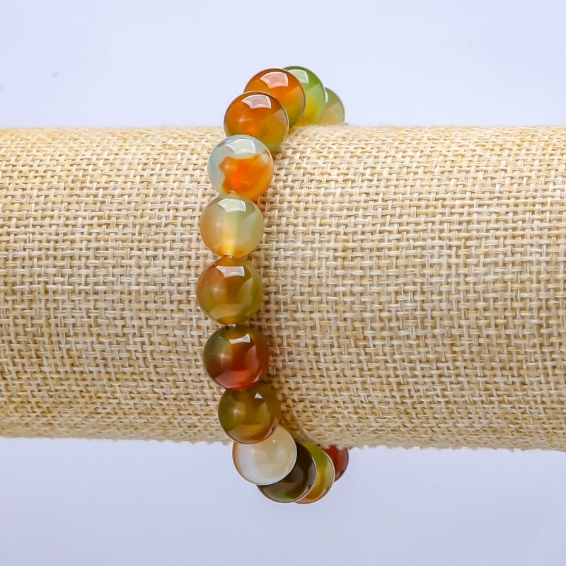 Bransoletka na gumce z brazylijskiego agatu, gładka kula, średnica 10 mm, długość 18 cm+