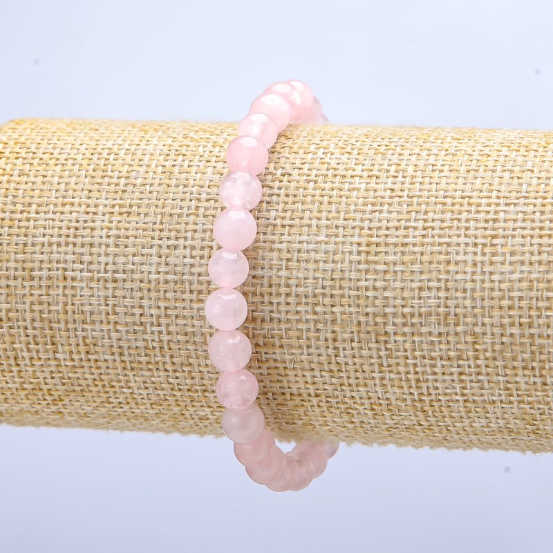 Bransoletka na elastycznej gumce z różowym kwarcem, gładkie kuleczki o średnicy 6 mm, długość 18 cm