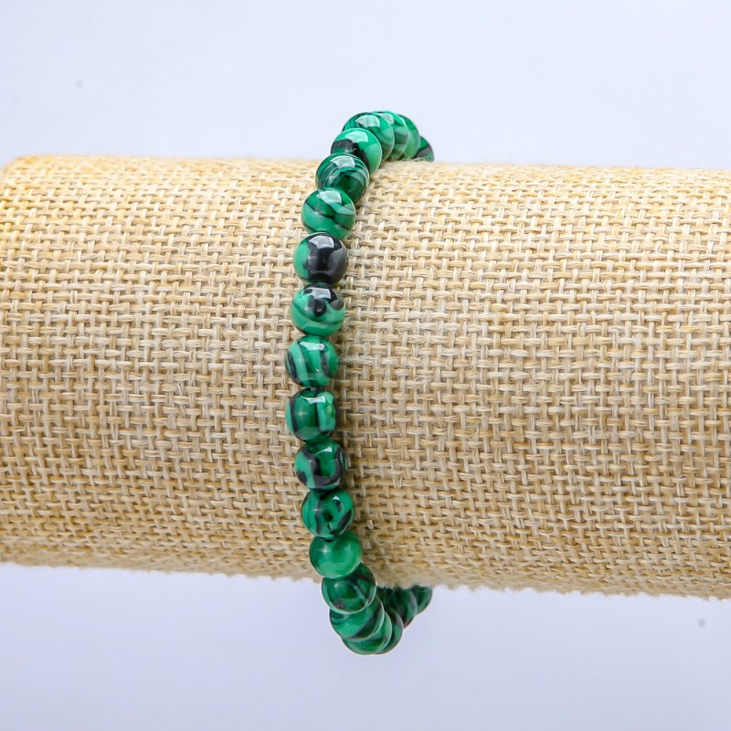 Bransoletka na gumce z malachitu (prasowanego) – gładkie kule o średnicy 6 mm ±, długość 18 cm