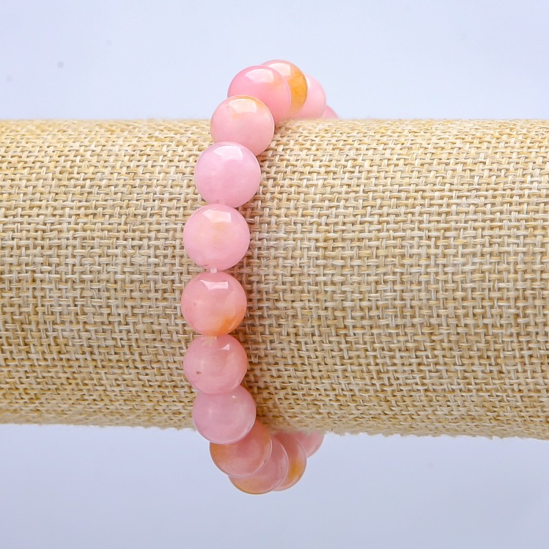 Bransoletka na gumce z tonowanego kwarcu, gładka kuleczka, o średnicy 10 mm, długość 18 cm