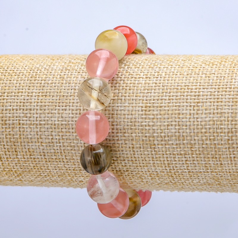 Bransoletka na gumce z naturalnym chalcedonem — mieszanka kulek, średnica 12 mm (±), długość 18 cm