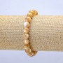 Bransoletka na gumce z naturalną masą perłową, beżowa. Gładka kulka, średnica 8 mm, długość 18 cm