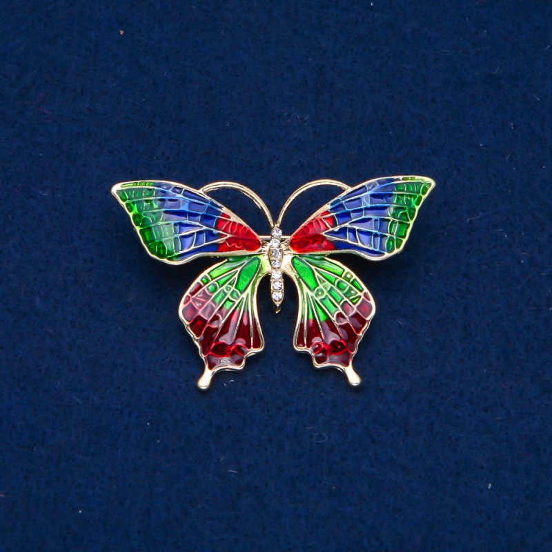Broszka «Motyl» z złocistego metalu, emalii i białych kryształów 30×50 mm +