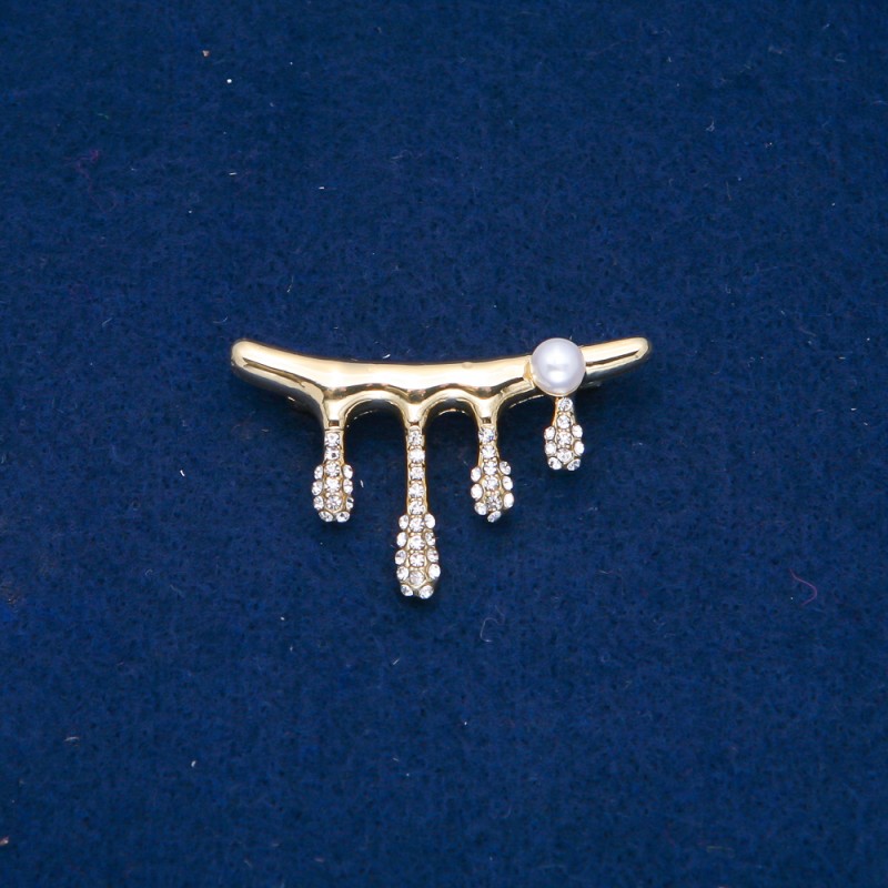 Broszka z metalem złocistym, białymi strassami i koralikiem 43×28 mm +