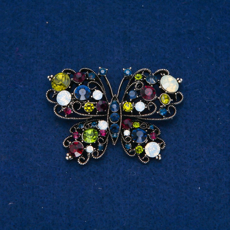 Broszka Motyl w ciemnozłotym odcieniu metalu, białe kryształy 38×54 mm +