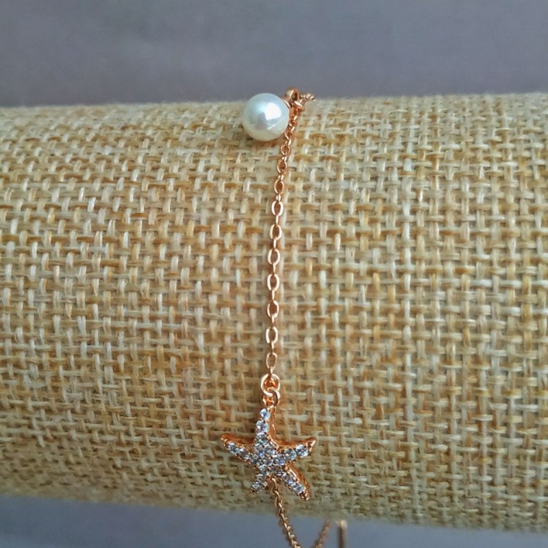 Bransoletka Xuping pozłocenie 18K z białymi kryształami i centralną koraliką, długość 17-20 cm, grubość 1,2 mm +