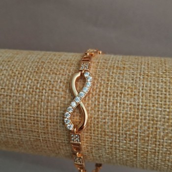 Bransoleta Xuping pozłacana 18K z białymi kryształami, długość 17–19 cm, grubość 3,7 mm +