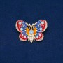 Broszka Motyl z metalu złocistego, emalii i białych, błękitnych, zielono-limonkowych i różowych kryształów 30x45 mm +
