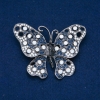 Wyprzedaż! Broszka «Motyl» z metalem srebrnym, czarne, niebieskie i białe kryształy 50×66 mm +