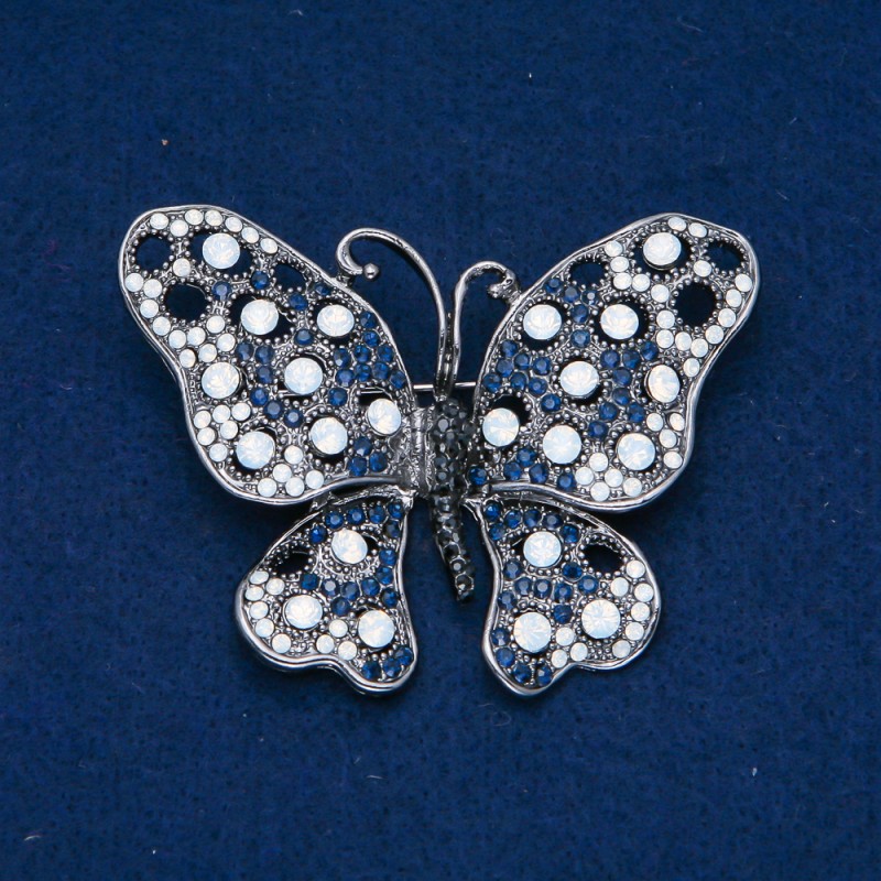 Broszka Motyl w srebrnym metalu, czarne, niebieskie i białe cyrkonie, 50×66 mm +