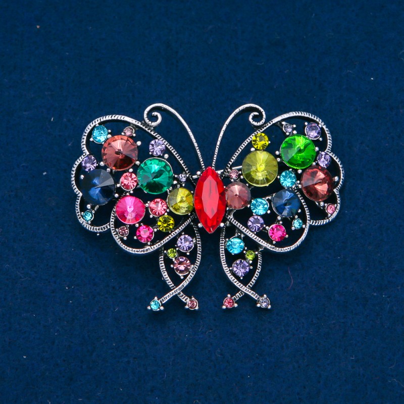 Broszka Motyl, metal w kolorze srebrnym, kolorowe kryształki 48×60 mm +