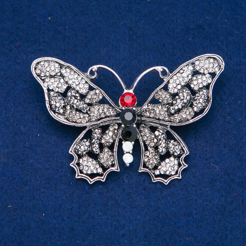 Broszka Motyl ze srebrnego metalu, szare, białe i czerwone kryształki 50x70 mm +