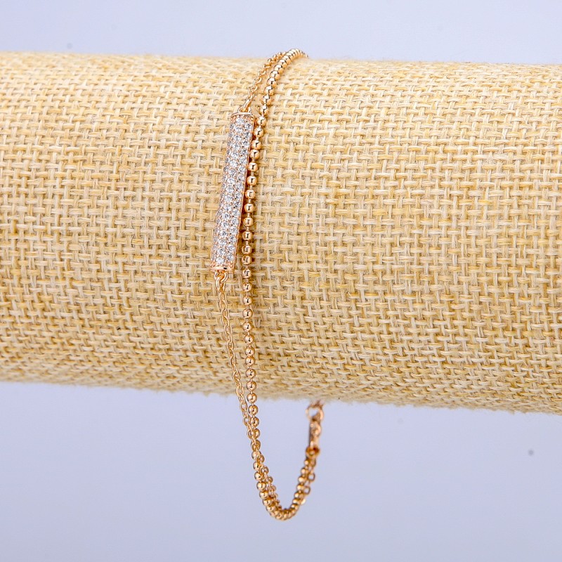Bransoletka Xuping pozłacana 18K z białymi strassami, grubość 3 mm, długość 18–21 cm