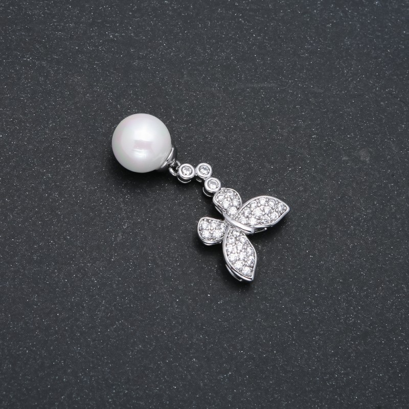 Wisiorek Xuping rodowany z perłą i białymi cyrkoniami, średnica 32×14 mm +