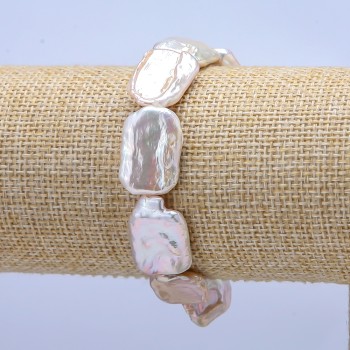 Bransoletka na gumce z barokowych pereł, średnica 22×14 mm, długość 18 cm