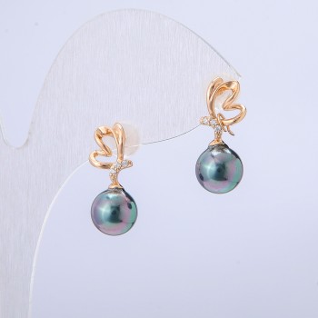 Kolczyki Xuping Pozłacane 18K z białymi kryształkami i czarnym koralikiem benzynowym, średnica 19x8 mm +