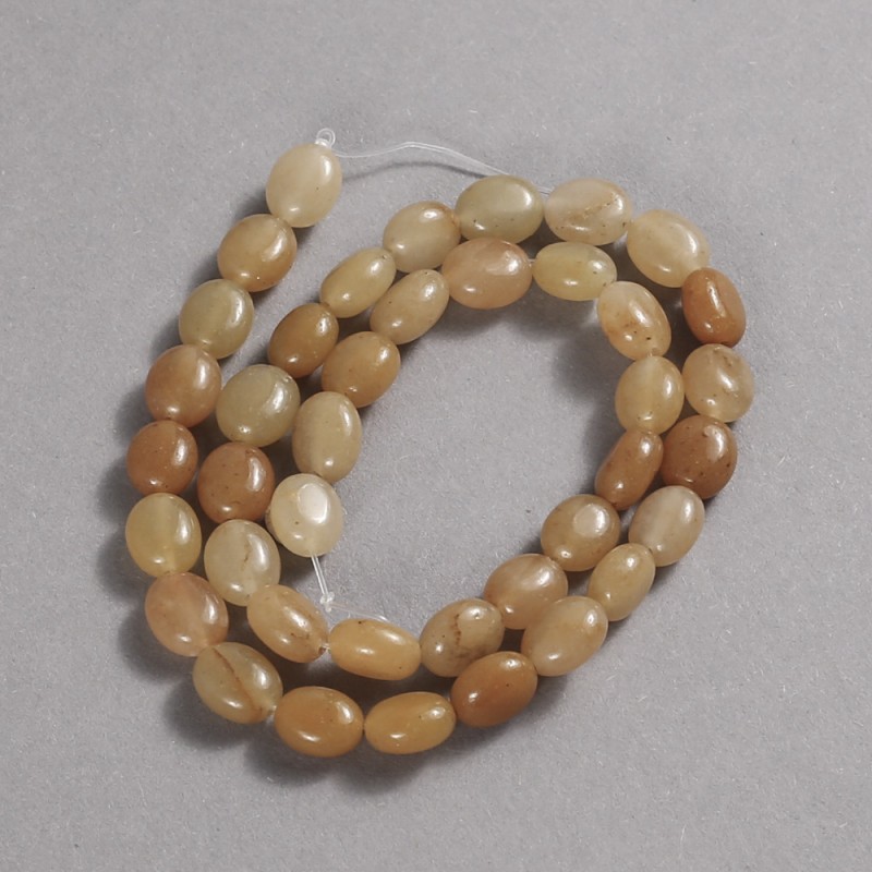 Koraliki na nitkę z naturalnego kamienia – żółty agat, gładkie owalne, 10×8 mm, długość 39 cm