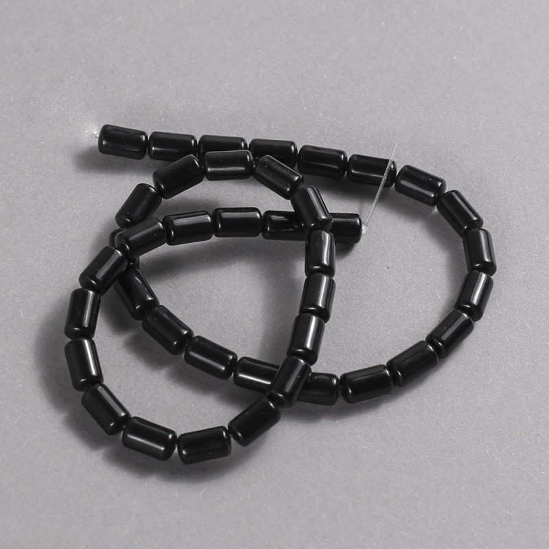 Koraliki agatowe na nitce (prasowane). Gładkie cylindryczne, średnica 10×6 mm, długość 41 cm