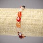 Bransoletka na gumce z naturalnym karneolem, gładki owal, średnica 10×8 mm, długość 18 cm +/-