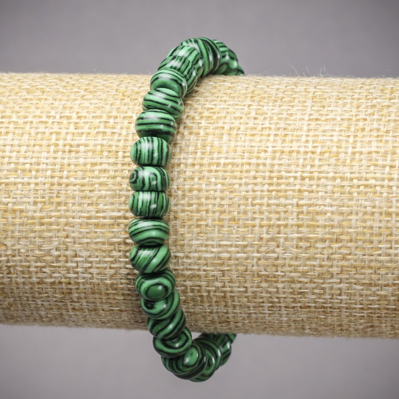 Bransoletka na gumce z malachitu (pras.) gładkie rondle, średnica 8×5 mm ±, długość 18 cm