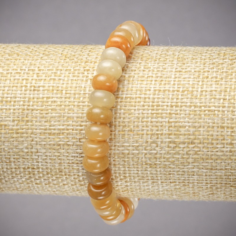 Bransoletka na gumce z naturalnego kamienia agat żółty, gładkie rondelki o średnicy 8×5 mm, długość 18 cm