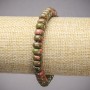Bransoletka na gumce z naturalnego kamienia: jaspis, heliotrop, unakit — gładkie rondelki, średnica około 8×5 mm, długość 18 cm