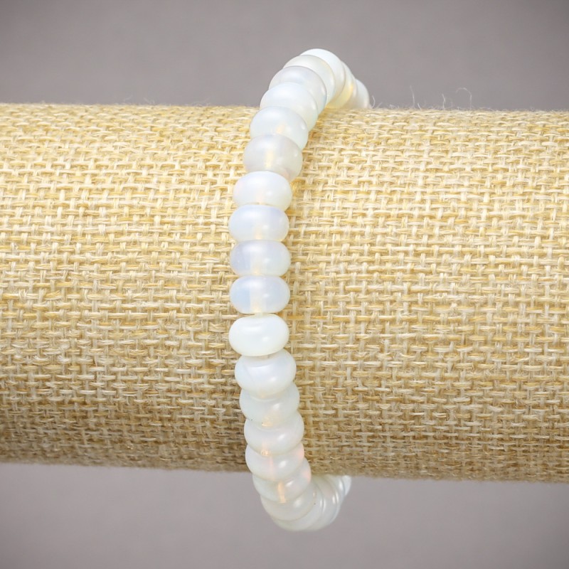 Bransoletka na gumce z syntetycznym kamieniem księżycowym, gładkie rondelki, średnica 8×5 mm, długość 18 cm