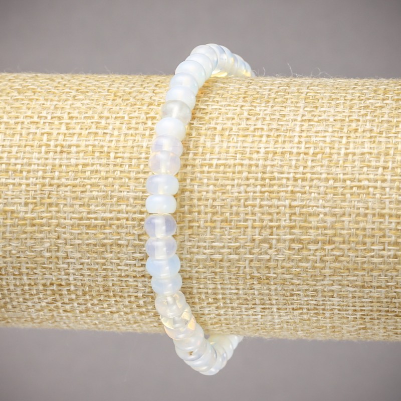 Bransoletka na gumce z kamieniem księżycowym (syntetyczny) – gładkie rondelki o średnicy 6×4 mm, długość 18 cm
