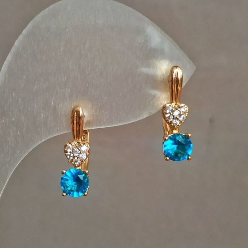 Kolczyki Xuping Pozłacane 18K z białymi cyrkoniami i błękitnym kryształem, średnica 16×5 mm +