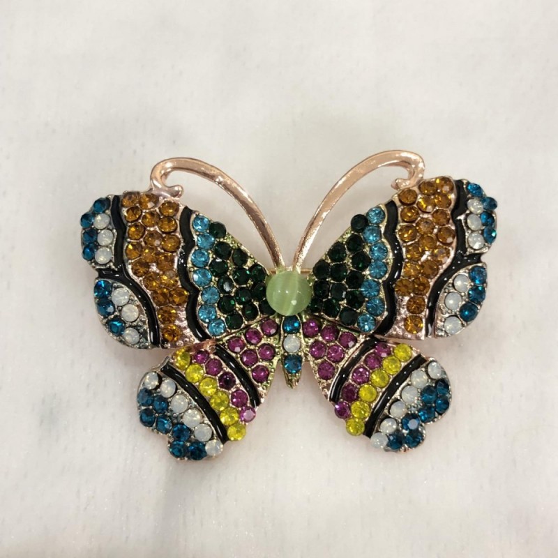 Broszka Motyl złocisto-różowy metal, różnokolorowe strass i zielona koralika 46×34 mm +