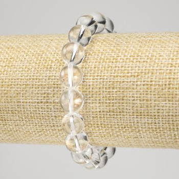 Bransoletka na gumce z kryształu górskiego, gładka kulka, średnica 10 mm+