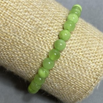 Bransoletka na gumce z naturalnego onyksu, gładka kulka, średnica 6 mm+