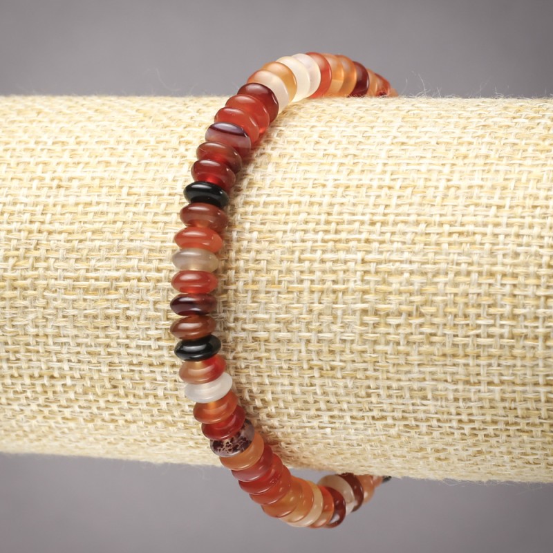 Bransoletka na gumce z naturalnego kamienia karneol, gładkie rondelki, średnica 6×3 mm+