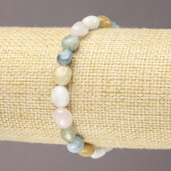 Bransoletka na gumce z naturalnego morganitu, fasetowana kulka, 7×9 mm