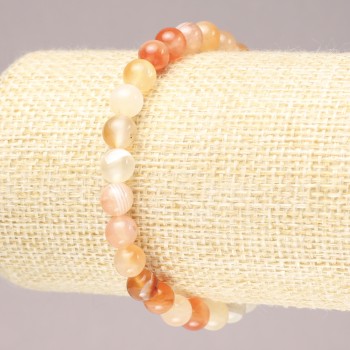 Bransoletka na gumce z naturalnego agatu pomarańczowy, gładka kulka, średnica 6,5 mm+