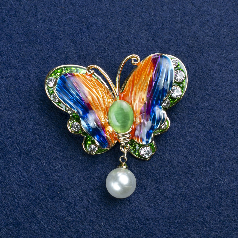 Broszka Motyl złocisty metal, kocie oko, emalia, kryształki strassowe i koralik 45×40 mm +