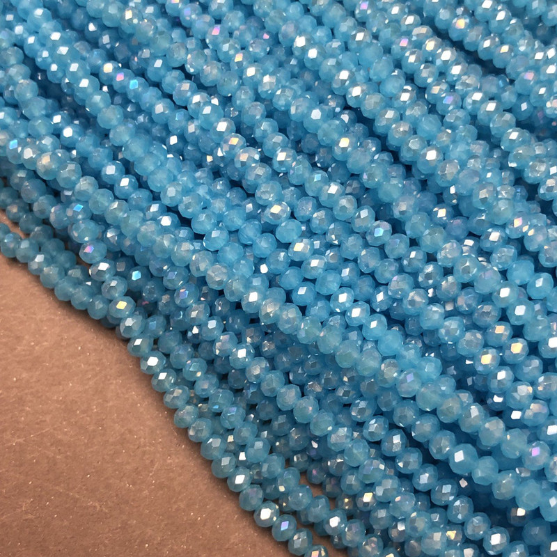 Koraliki z czeskiego kryształu na żyłce, niebieskie z benzynowym odcieniem, fasetowane rondelki, średnica 3,5×3 mm, długość 36–38 cm