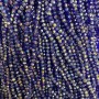 Koraliki czeskiego kryształu na żyłce, niebieskie z benzynowym napylaniem, fasetowane rondelki, średnica 3,5×3 mm, długość 33 cm