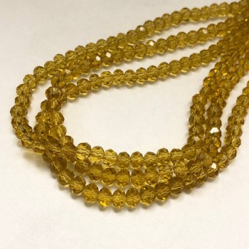 Koraliki czeskiego kryształu na żyłce jubilerskiej – pomarańczowo-brzoskwiniowe, przejrzyste, fasetowane rondelki, średnica 6x4,5 mm, długość 38-40 cm +