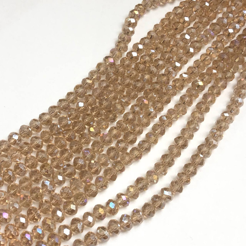 Koraliki czeskiego kryształu w odcieniu szampańskim, przezroczyste na żyłce, granowane rondelki, średnica 6×4,5 mm + -, długość 38–40 cm +